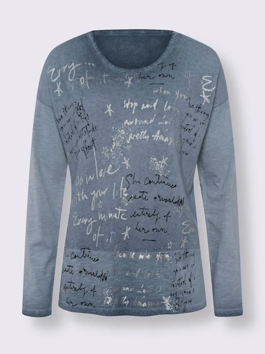 T-shirt à manches longues en coton avec imprimé feuille.