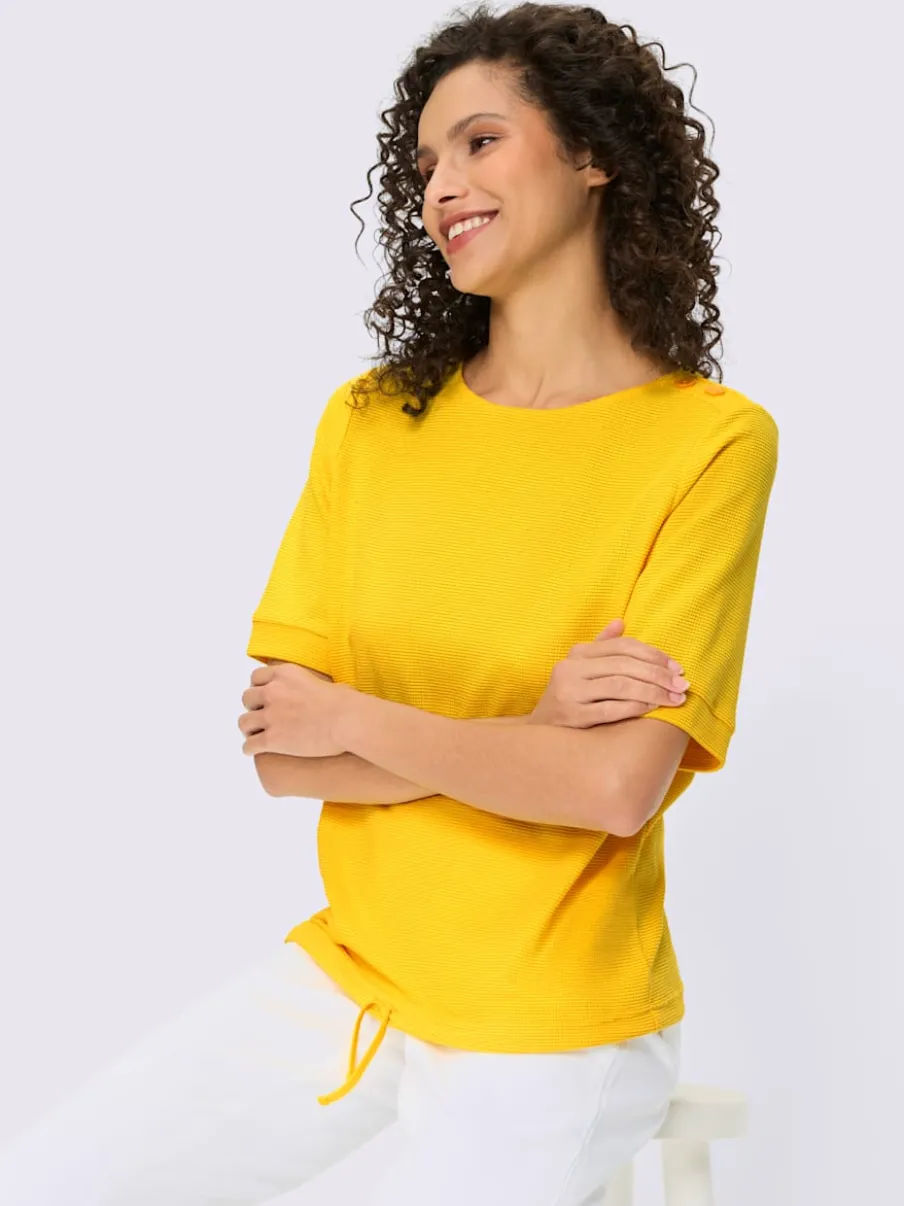 T-shirts manches courtes avec encolure ronde et bouton