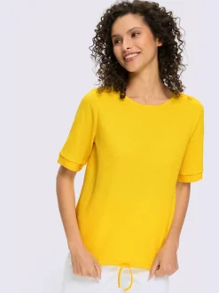 T-shirts manches courtes avec encolure ronde et bouton