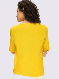 T-shirts manches courtes avec encolure ronde et bouton