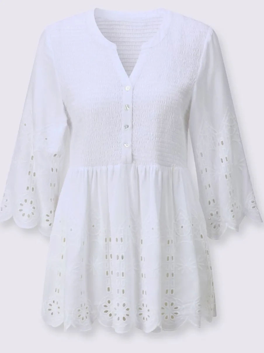 Tunique en dentelle avec empiècements et patte de boutonnage