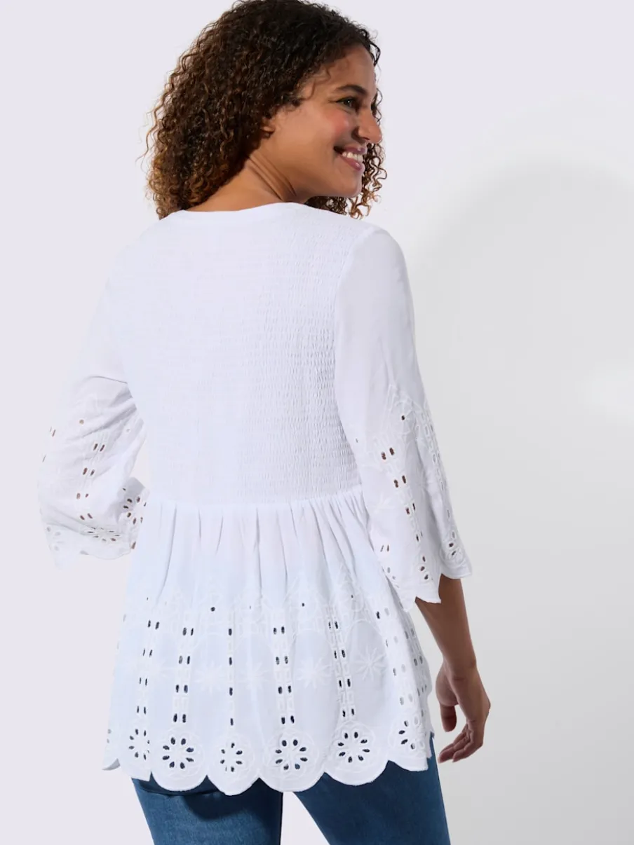 Tunique en dentelle avec empiècements et patte de boutonnage