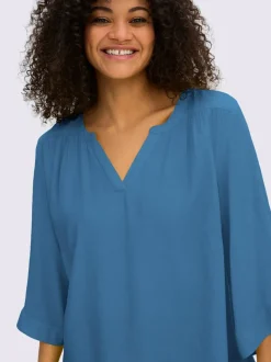 Tunique fronces aux épaules