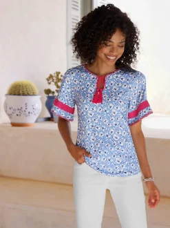 Tunique à motifs floraux avec encolure ronde et manches évasées