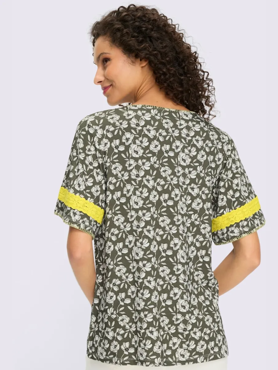 Tunique à motifs floraux avec encolure ronde et manches évasées