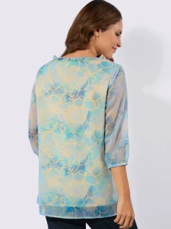 Tuniques à encolure en V avec motifs fleuris et volants