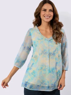Tuniques à encolure en V avec motifs fleuris et volants