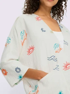 Veste chemisier avec broderie et manches 3/4 chauve-souris
