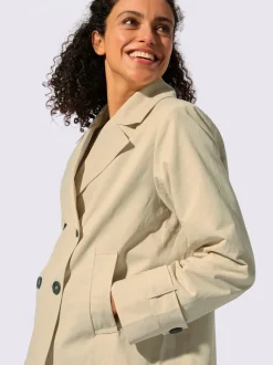 Veste courte à col à revers et manches longues avec poches raglan