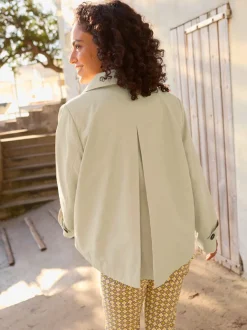 Veste courte à col à revers et manches longues avec poches raglan