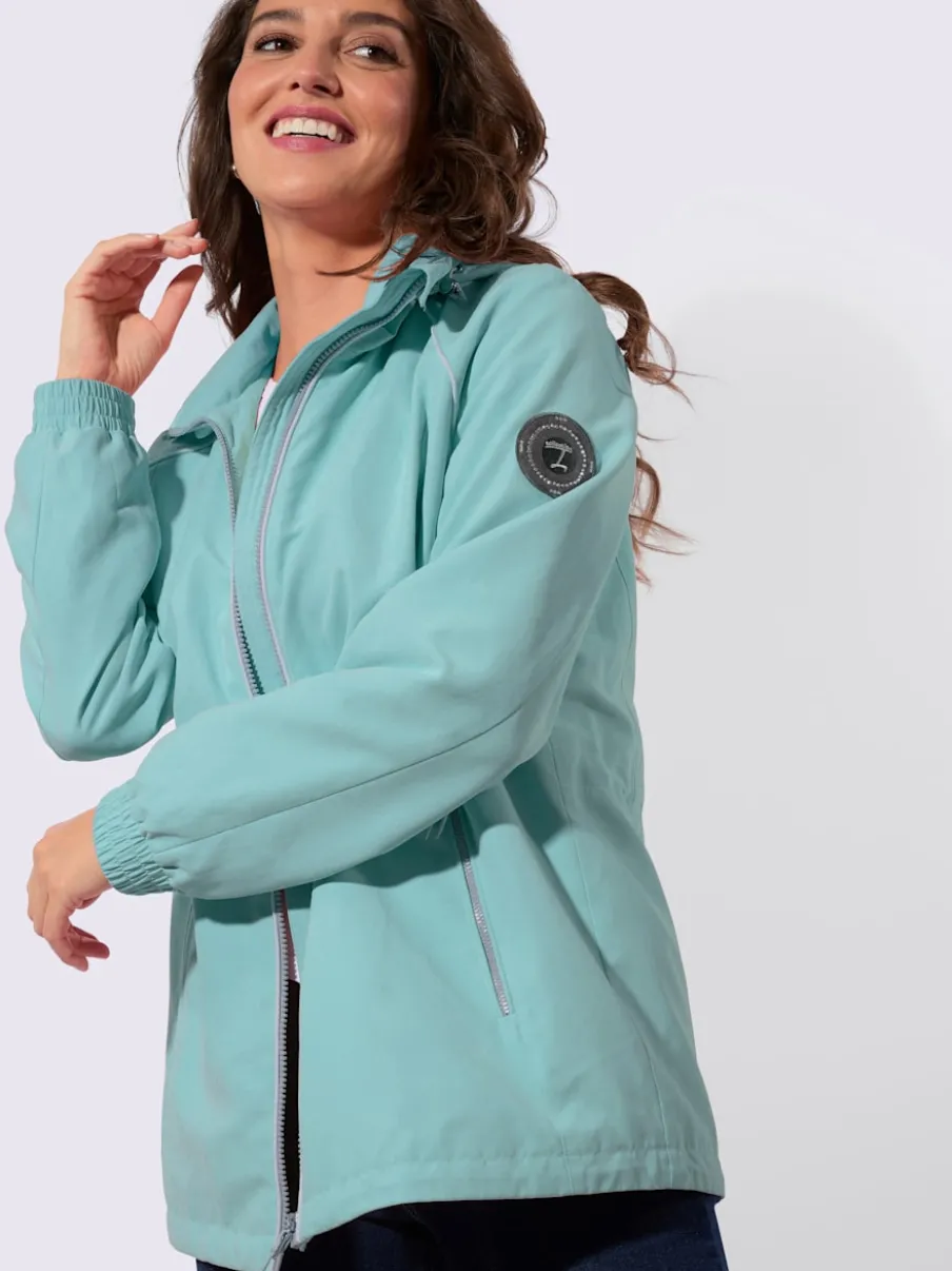 Veste de mi-saison avec capuche et poches zippées