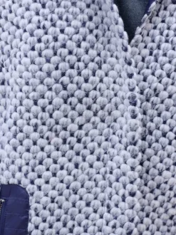 Veste d'extérieur avec capuche amovible et poches.