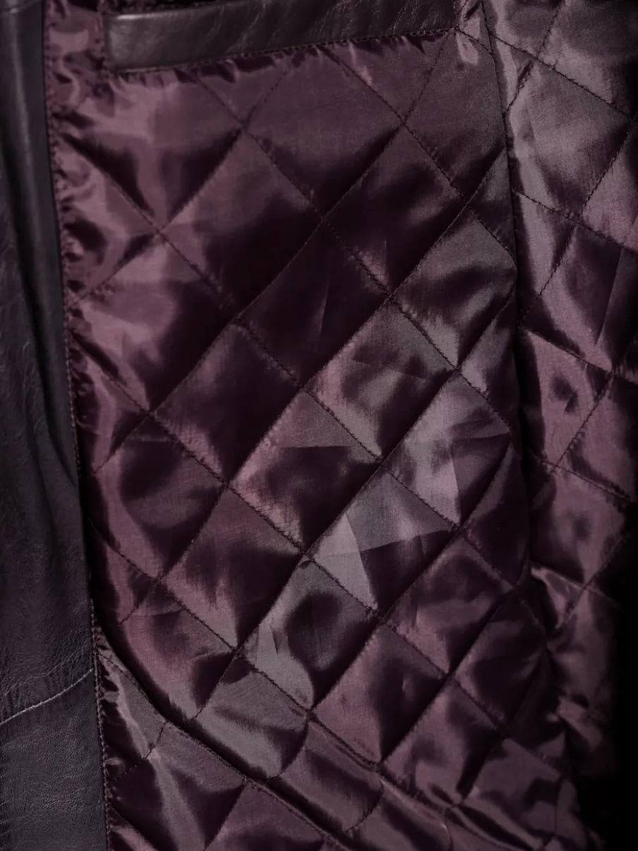 Veste en cuir d'agneau avec col convertible et empiècements affinants