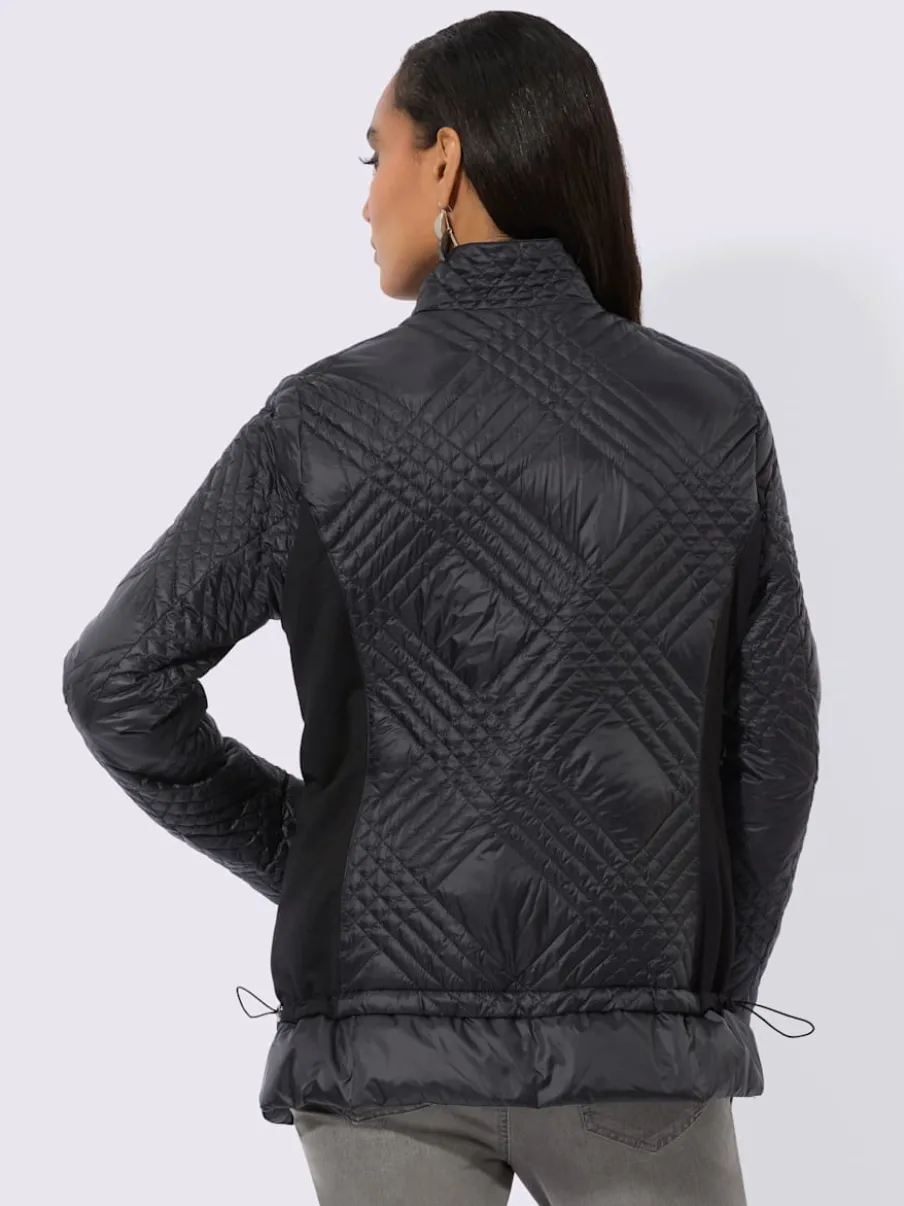 Veste en duvet avec col transformable et poches zippées