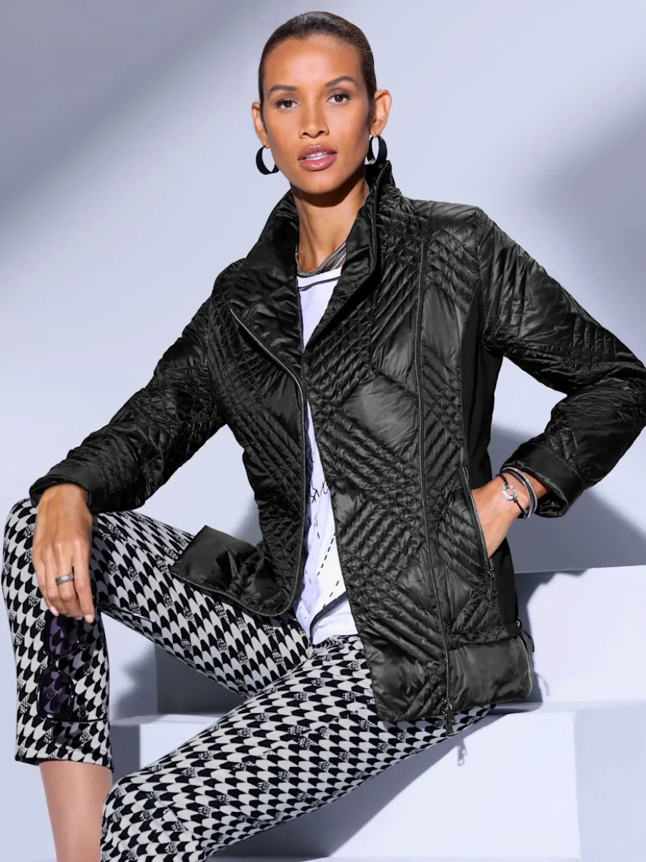 Veste en duvet avec col transformable et poches zippées