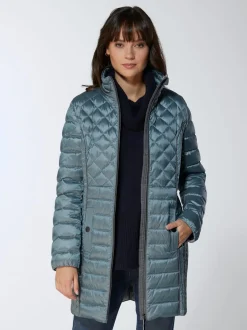 Veste en duvet matelassée avec col montant et poches