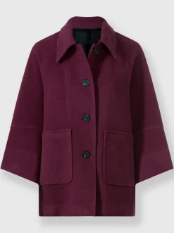 Veste en laine avec col et manches larges et poches