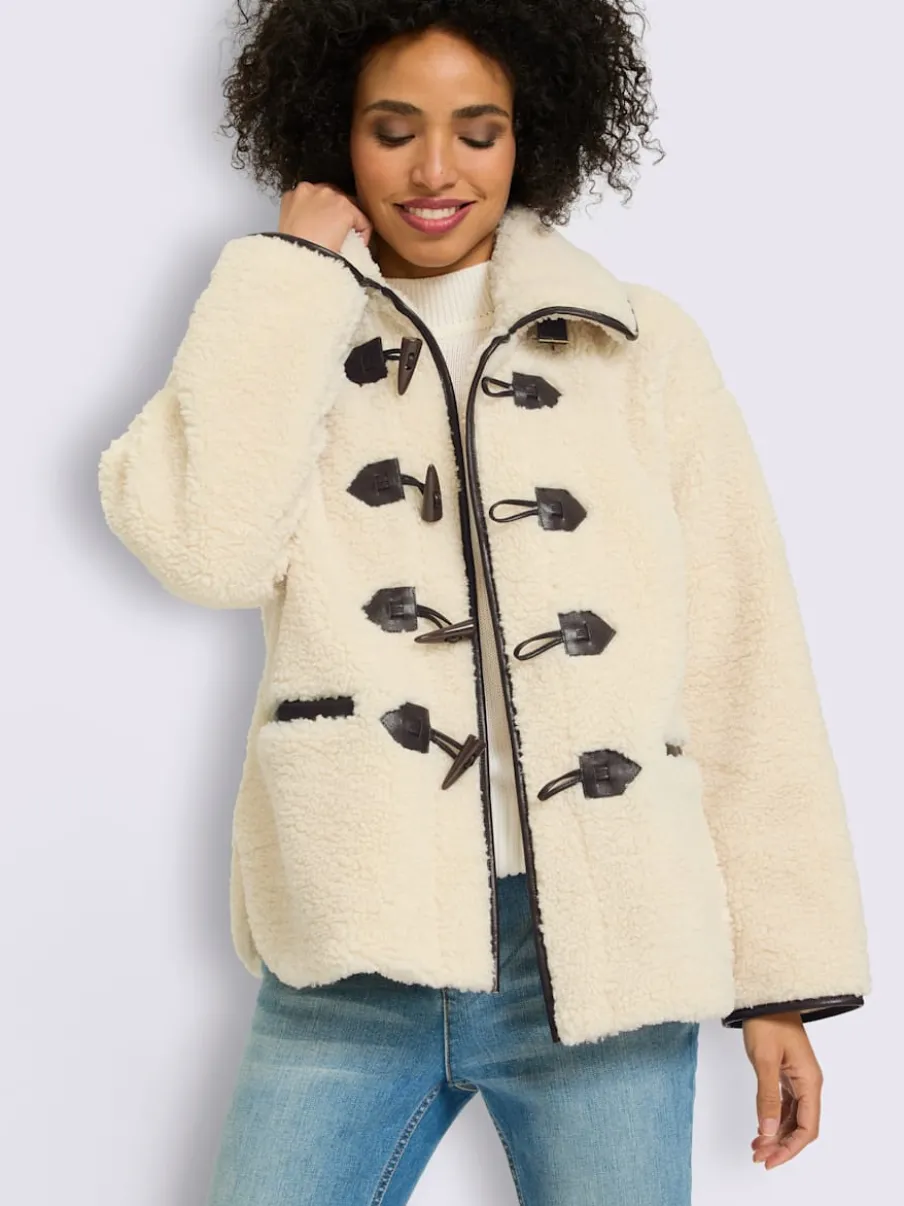 Veste en peluche passepoil contrasté