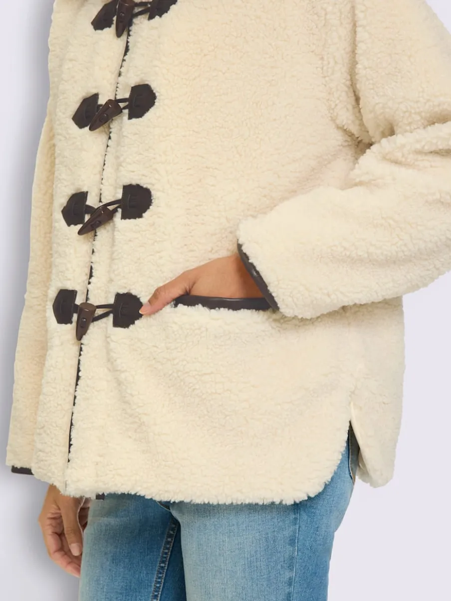 Veste en peluche passepoil contrasté