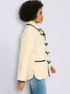 Veste en peluche passepoil contrasté