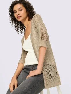 Veste en tricot ajouré avec manches chauve-souris et motif léger