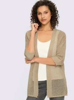Veste en tricot ajouré avec manches chauve-souris et motif léger