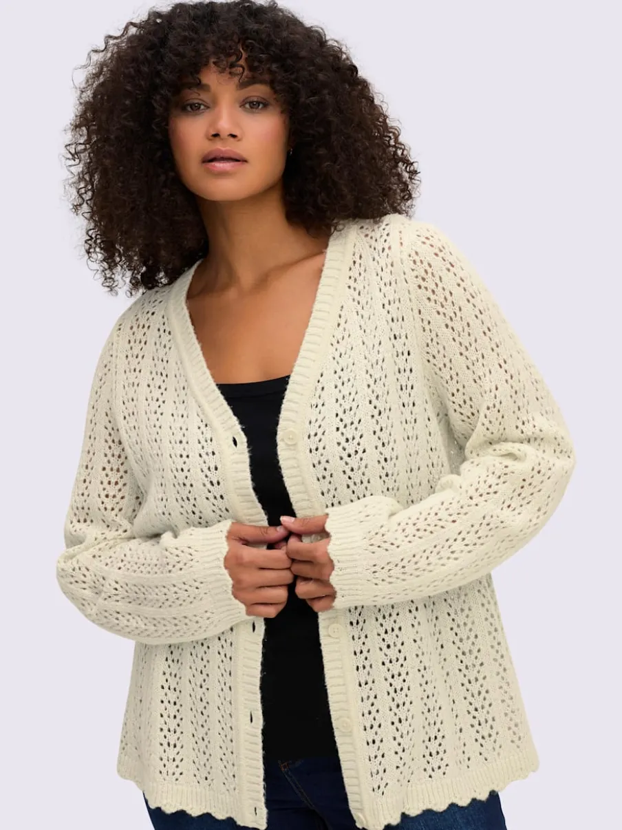 Veste en tricot ajouré coupe courte mode