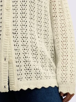 Veste en tricot ajouré coupe courte mode