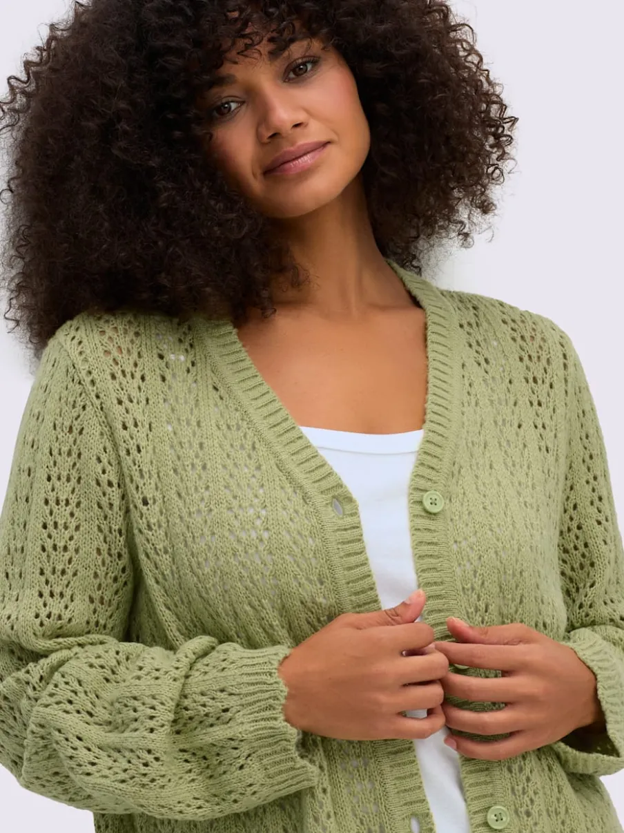 Veste en tricot ajouré coupe courte mode
