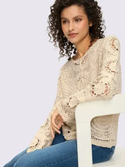 Veste en tricot ajouré à encolure ronde et manches longues