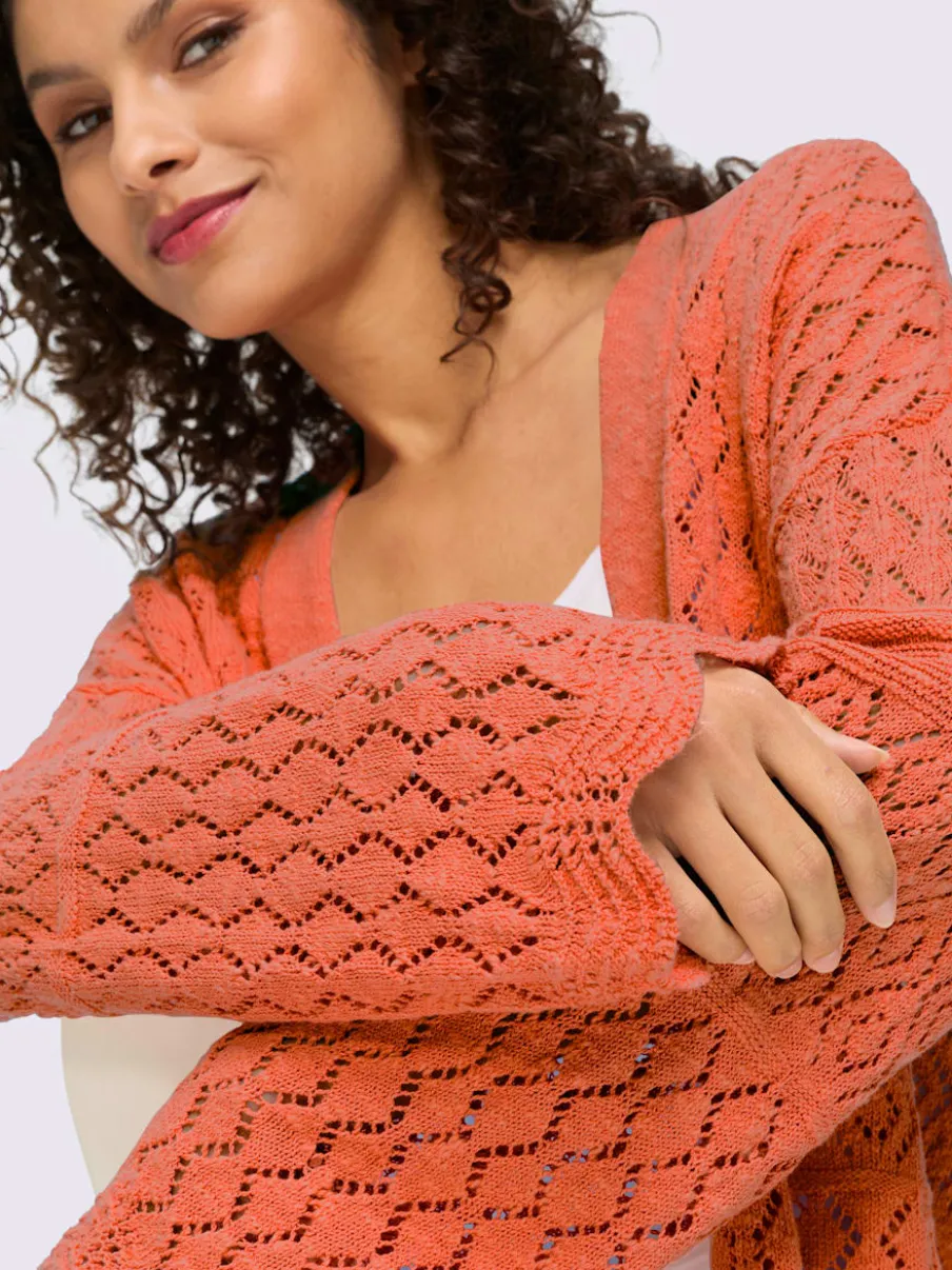 Veste en tricot ajouré à manches longues avec motif léger