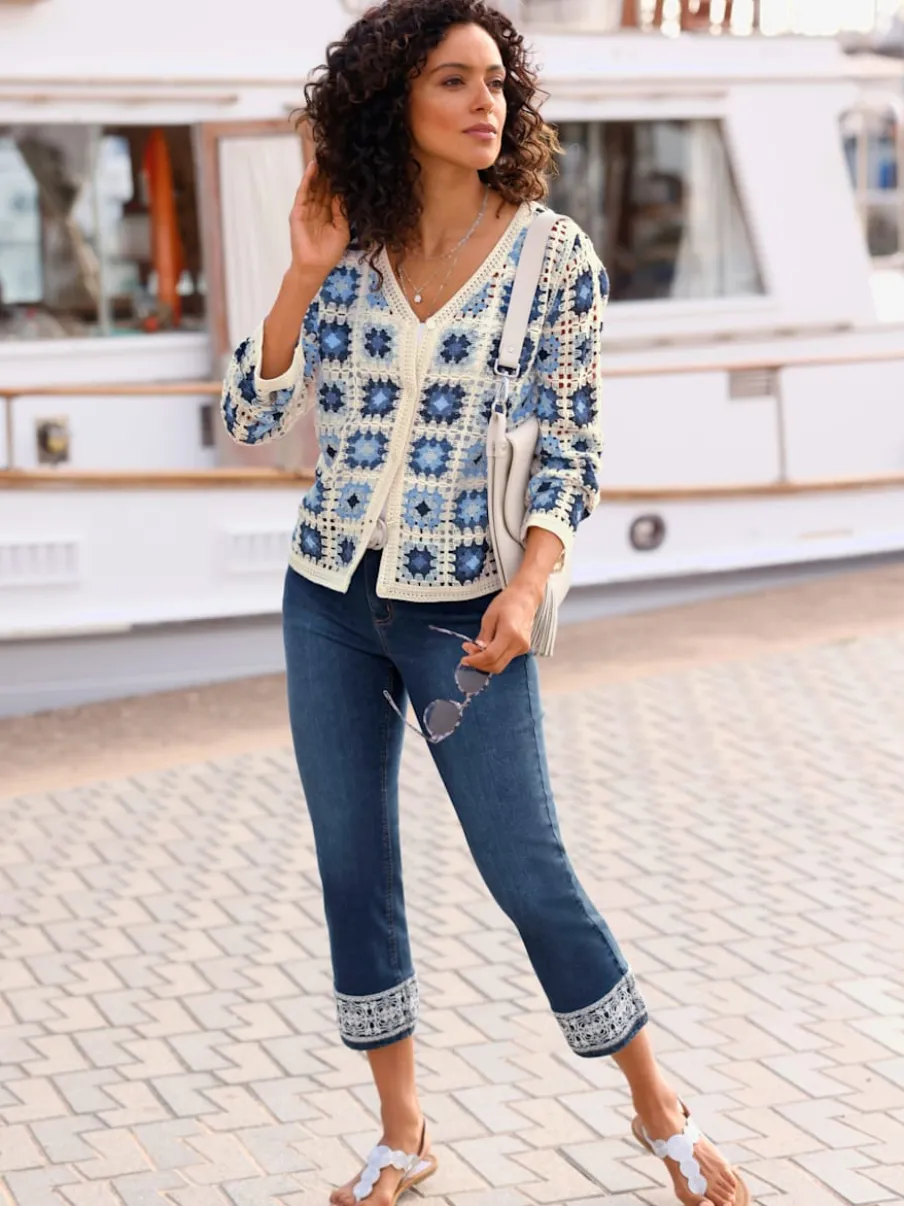 Veste en tricot aspect crochet avec col en V