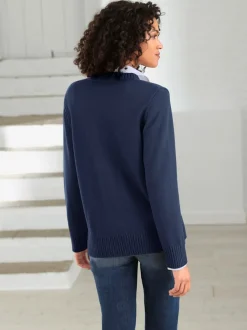 Veste en tricot avec boutons et manches longues confortables