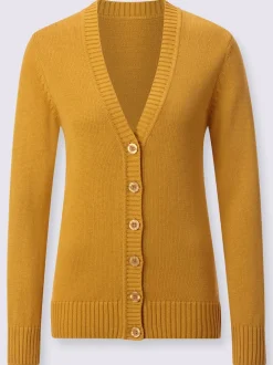 Veste en tricot avec boutons et manches longues confortables