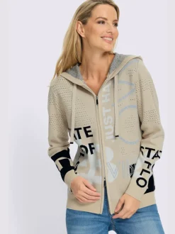 Veste en tricot avec capuche et motif ajouré