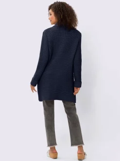 Veste en tricot avec col montant et poches fendues
