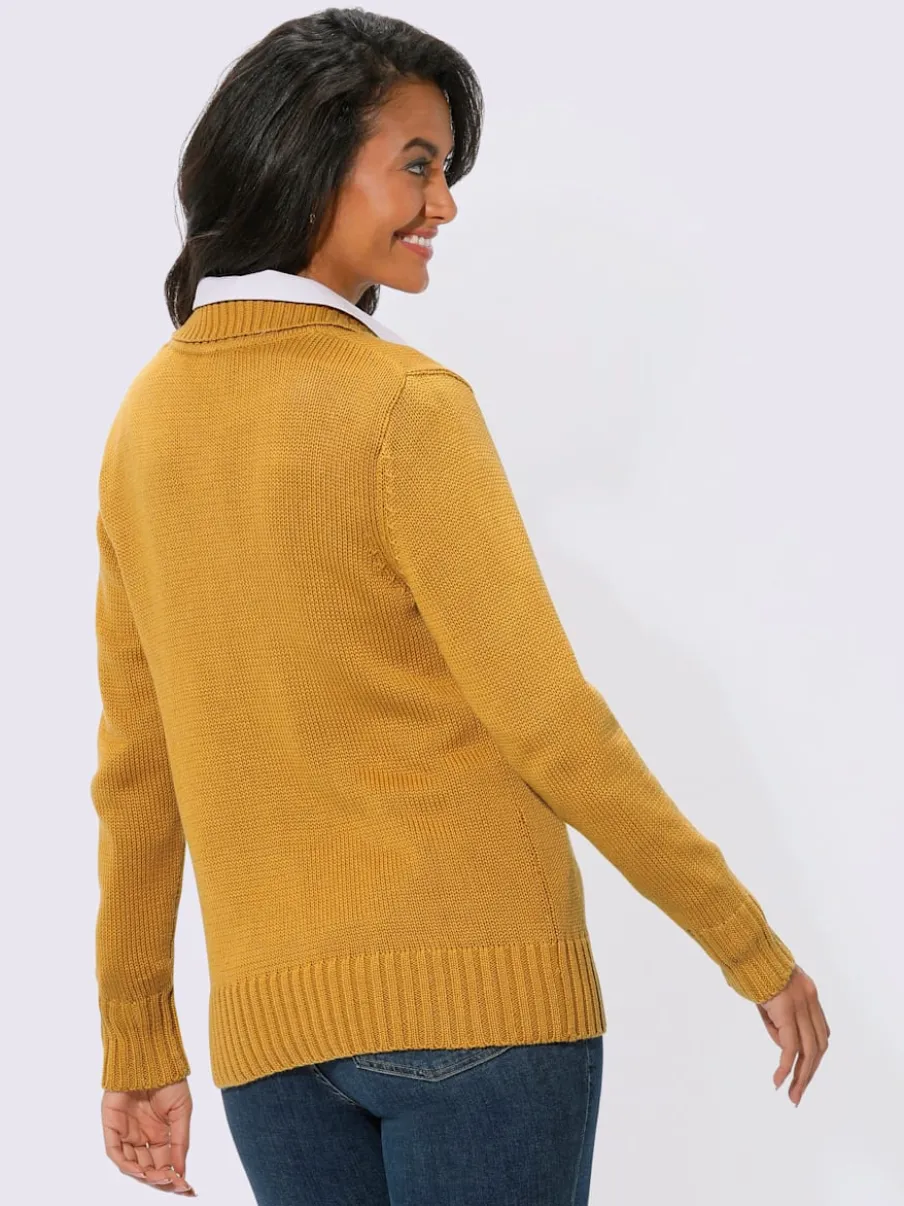 Veste en tricot avec glissière et finitions côtelées