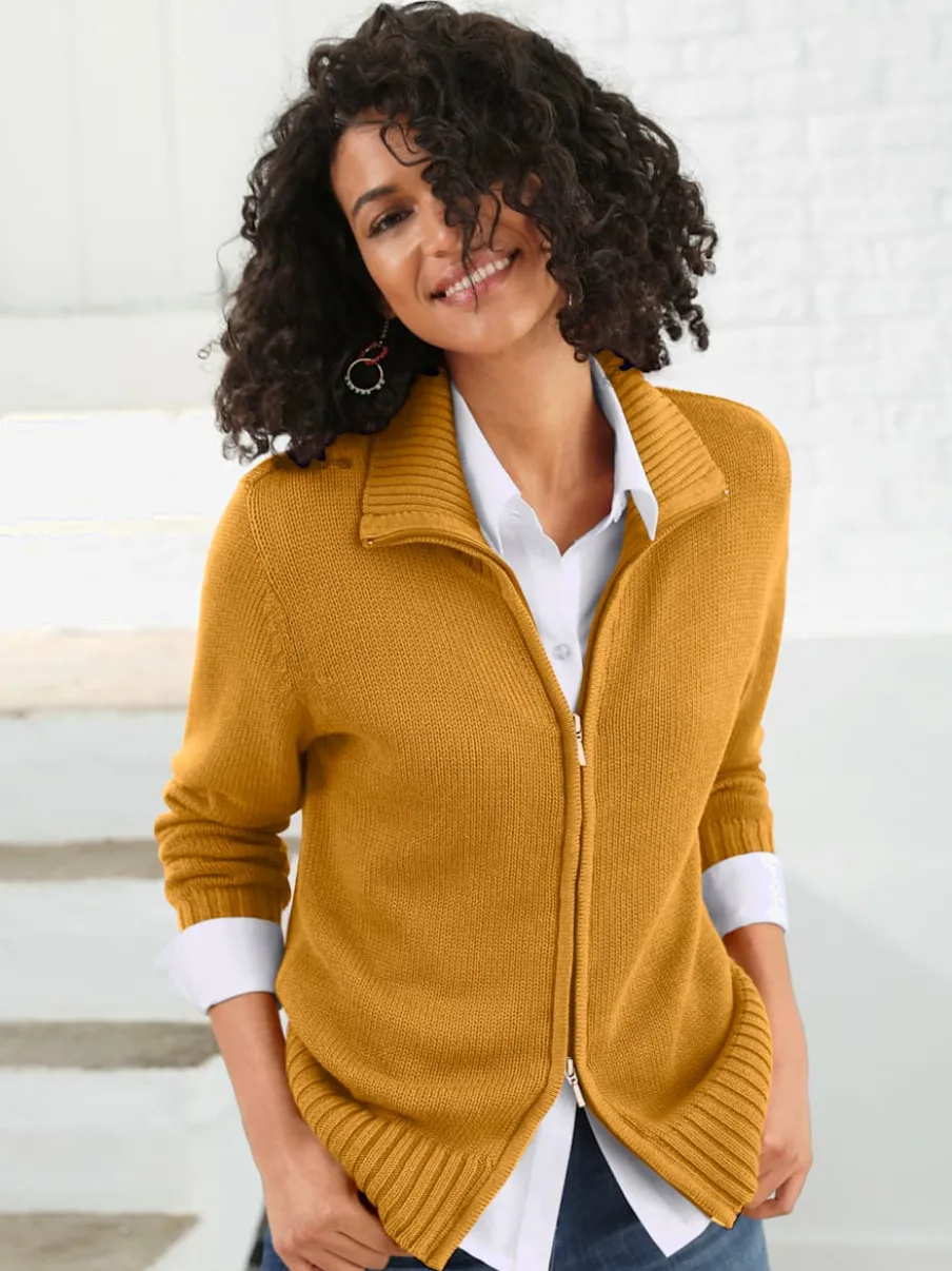 Veste en tricot avec glissière et finitions côtelées