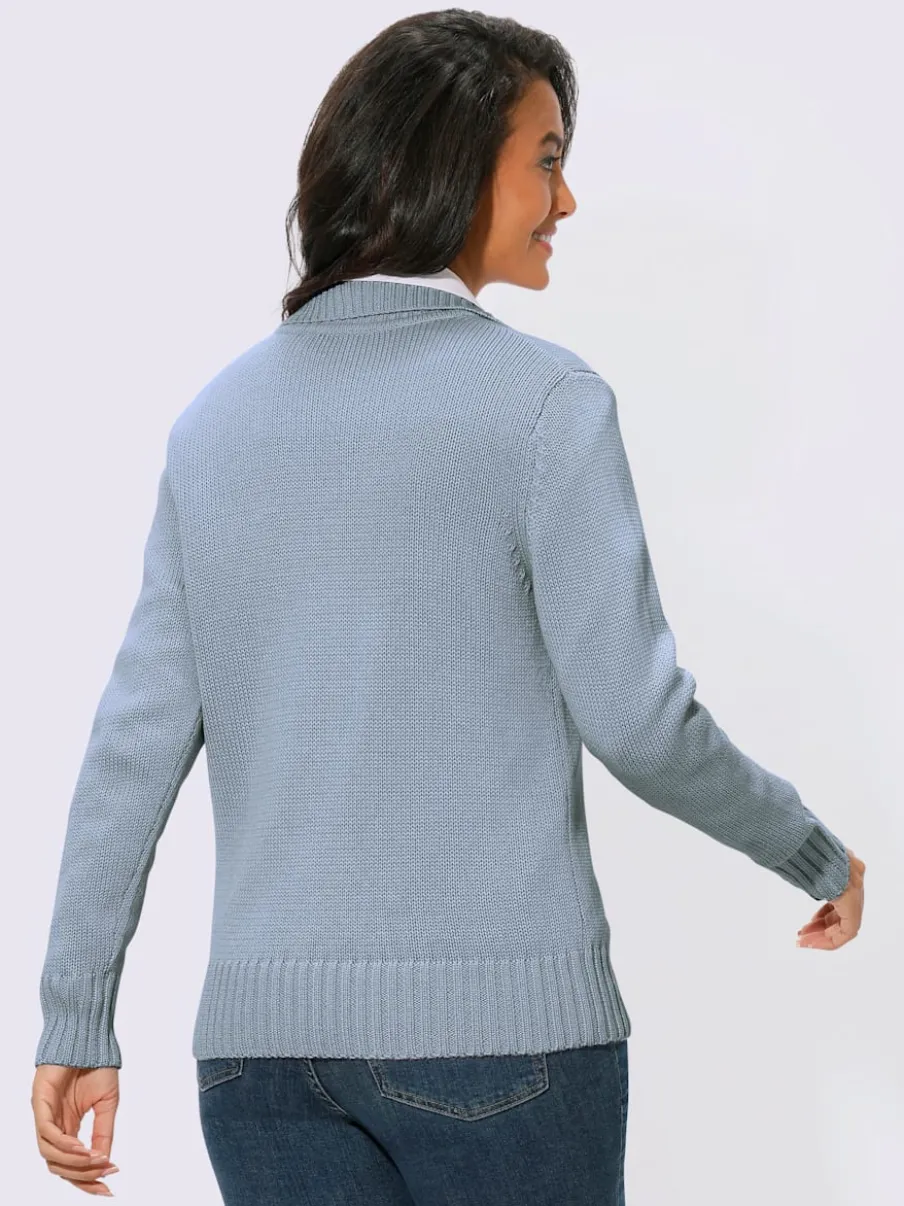 Veste en tricot avec glissière et finitions côtelées