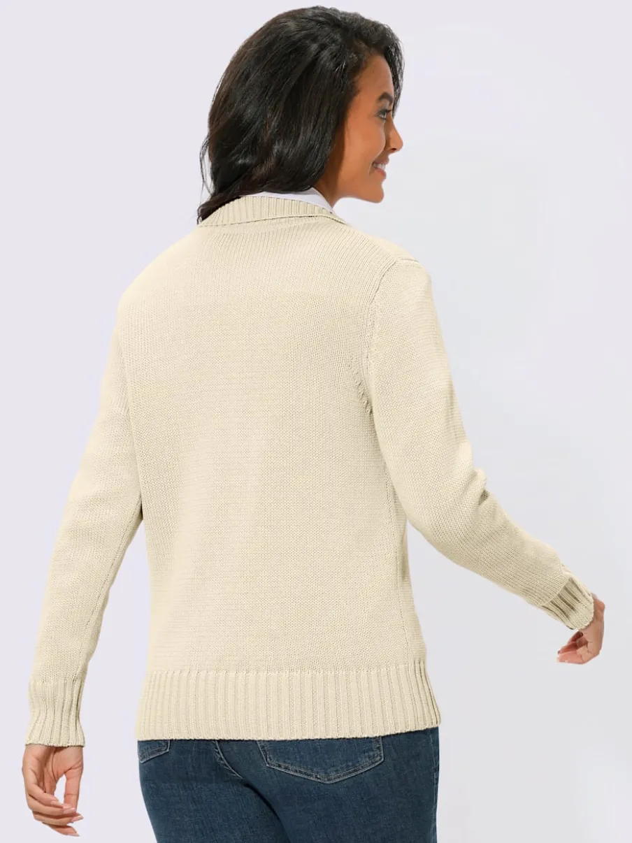 Veste en tricot avec glissière et finitions côtelées