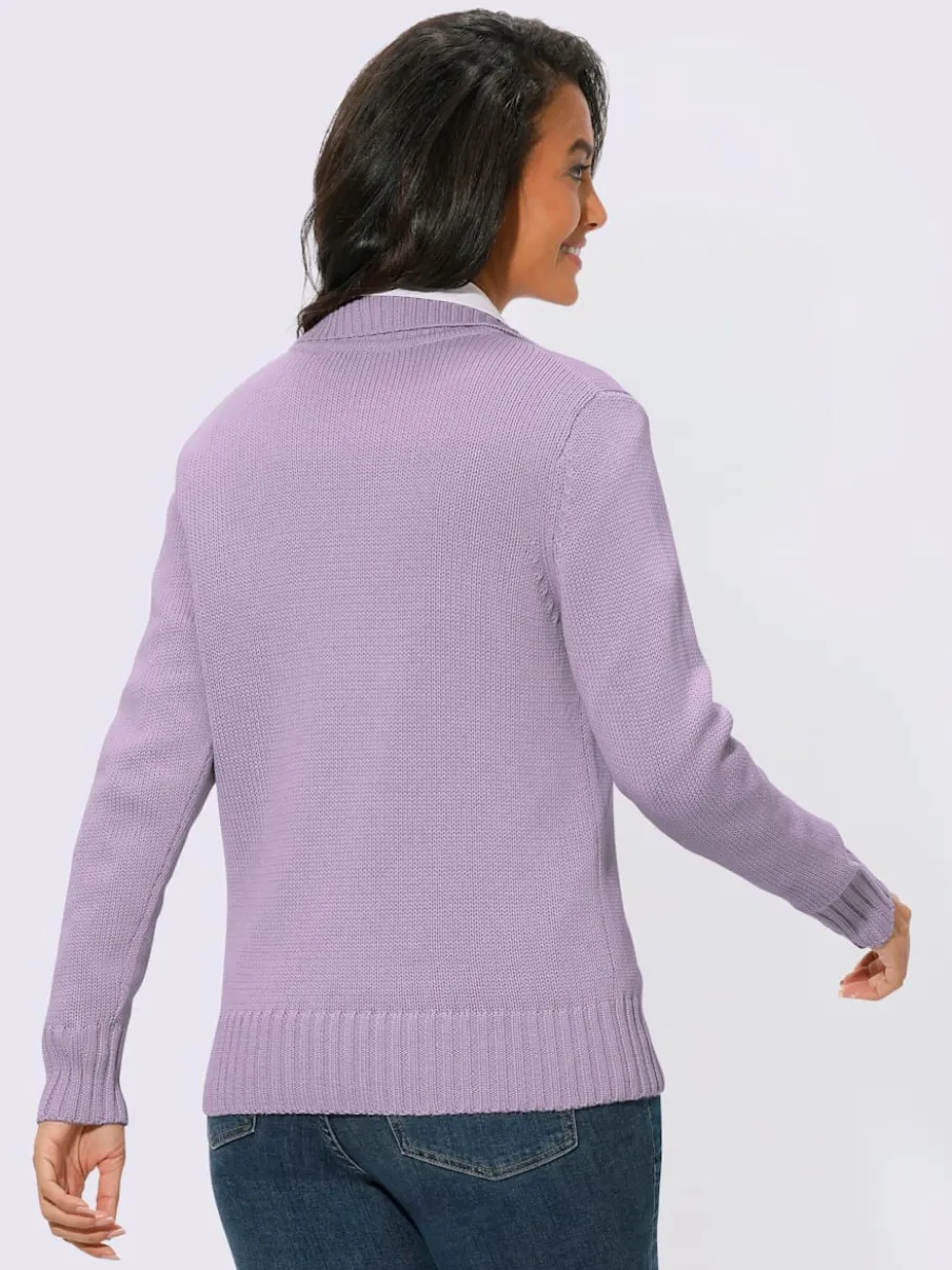 Veste en tricot avec glissière et finitions côtelées