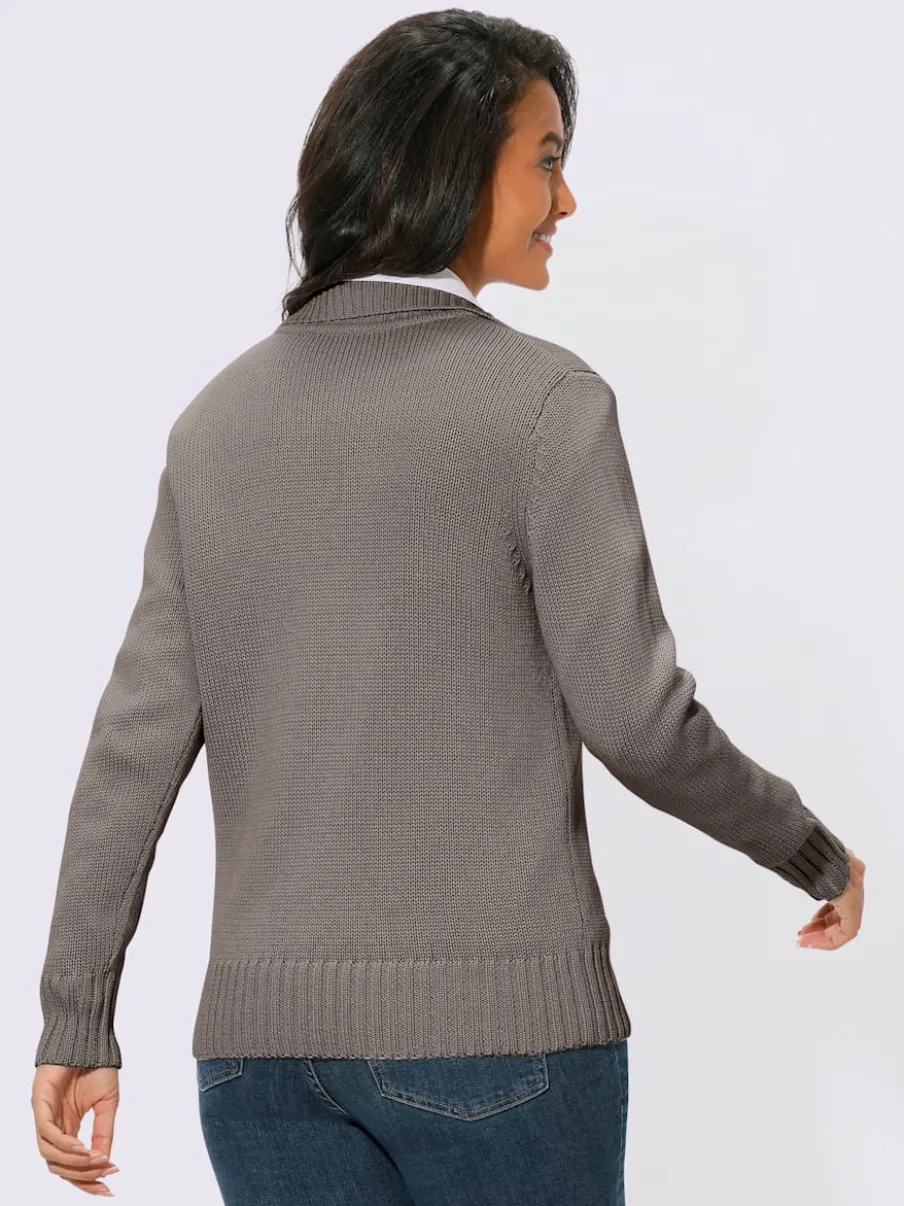 Veste en tricot avec glissière et finitions côtelées