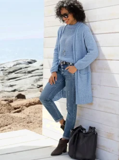 Veste en tricot avec manches longues et grandes poches plaquées