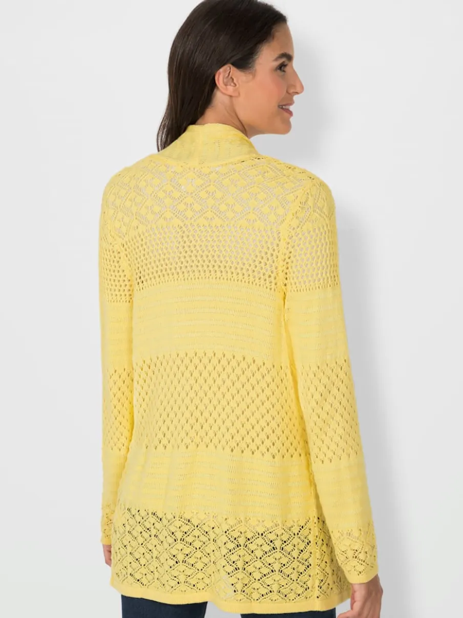 Veste en tricot avec motif ajouré et col à revers