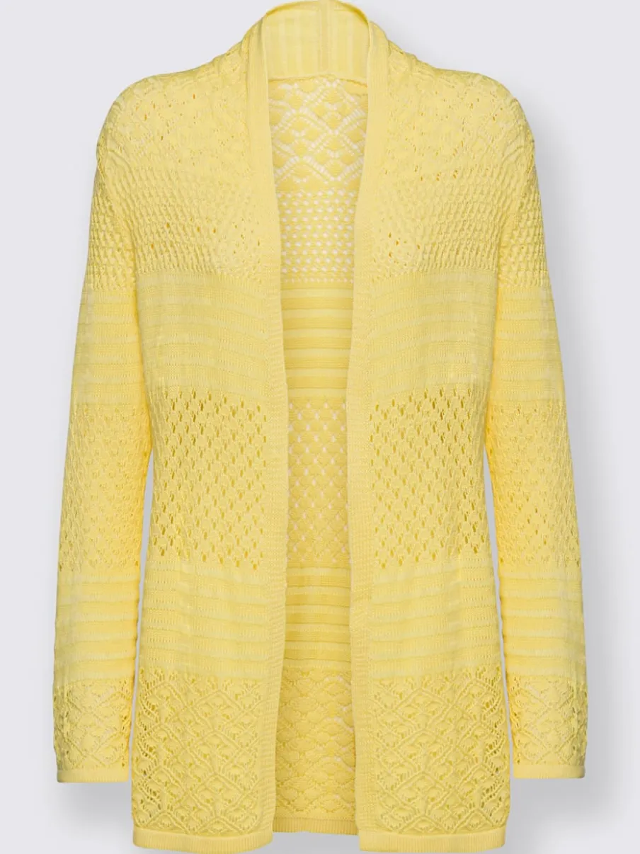 Veste en tricot avec motif ajouré et col à revers