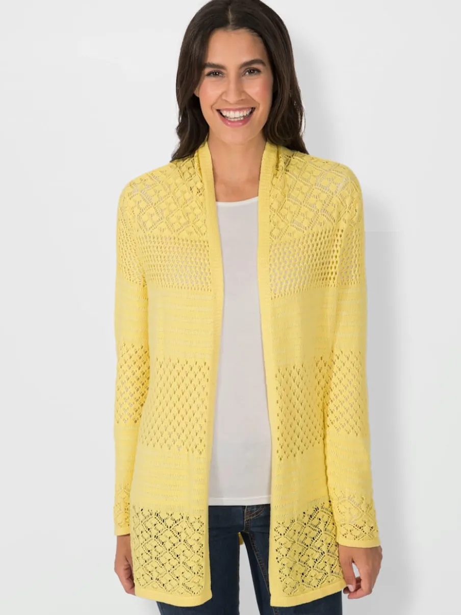 Veste en tricot avec motif ajouré et col à revers