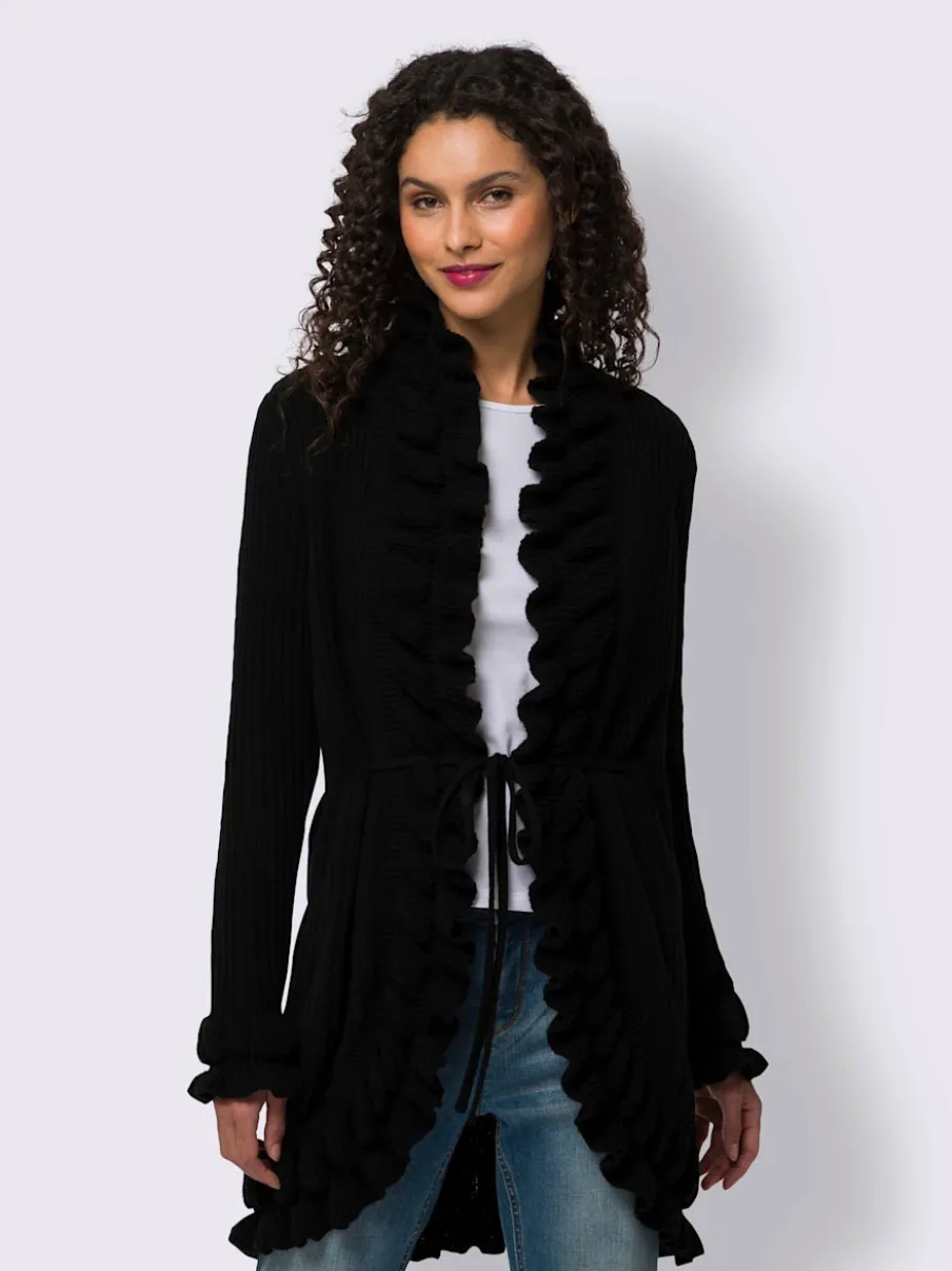 Veste en tricot avec volants et motifs variés