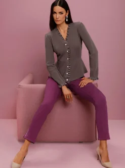 Veste en tricot à col en V et manches longues avec volants