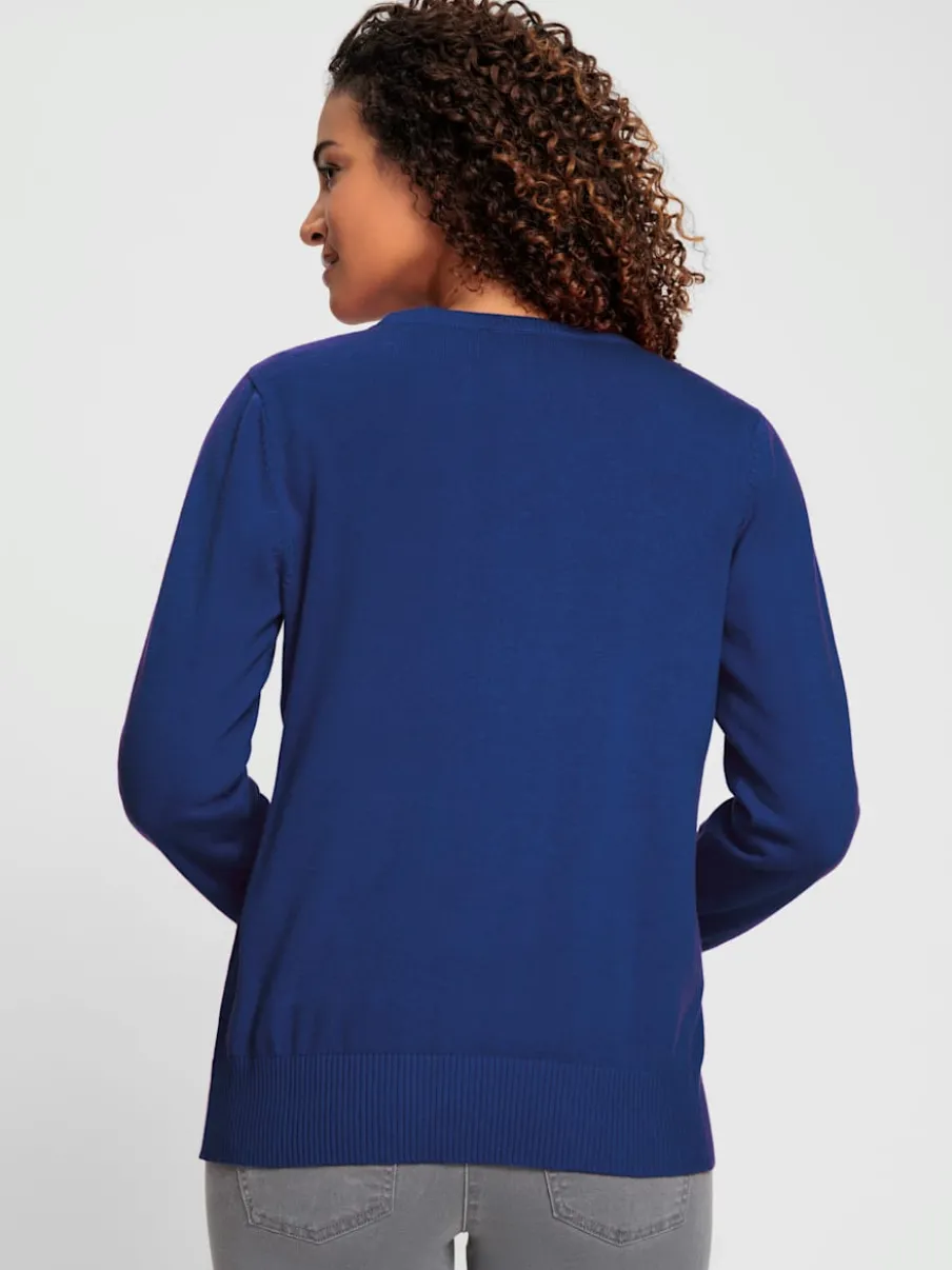 Veste en tricot doux avec col en V boutonné