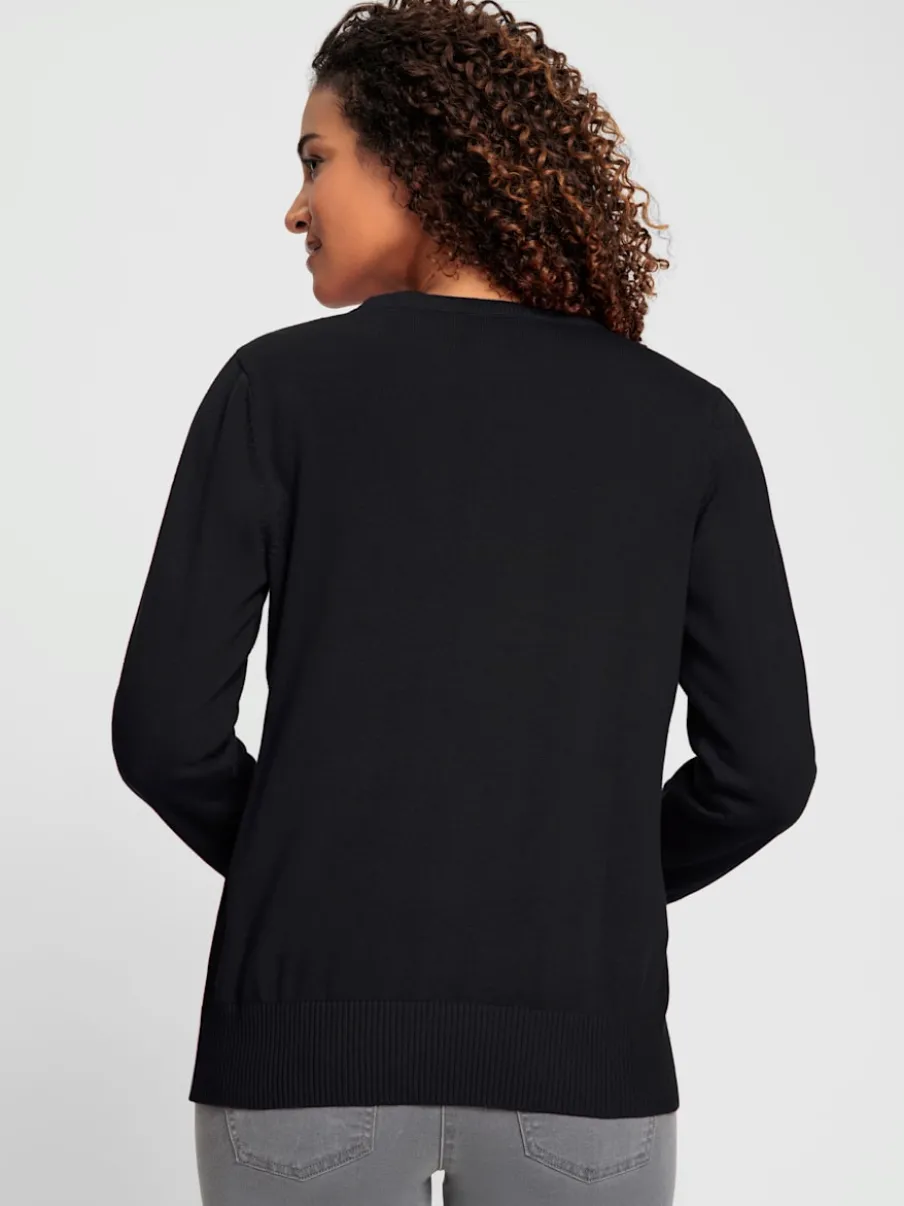 Veste en tricot doux avec col en V boutonné
